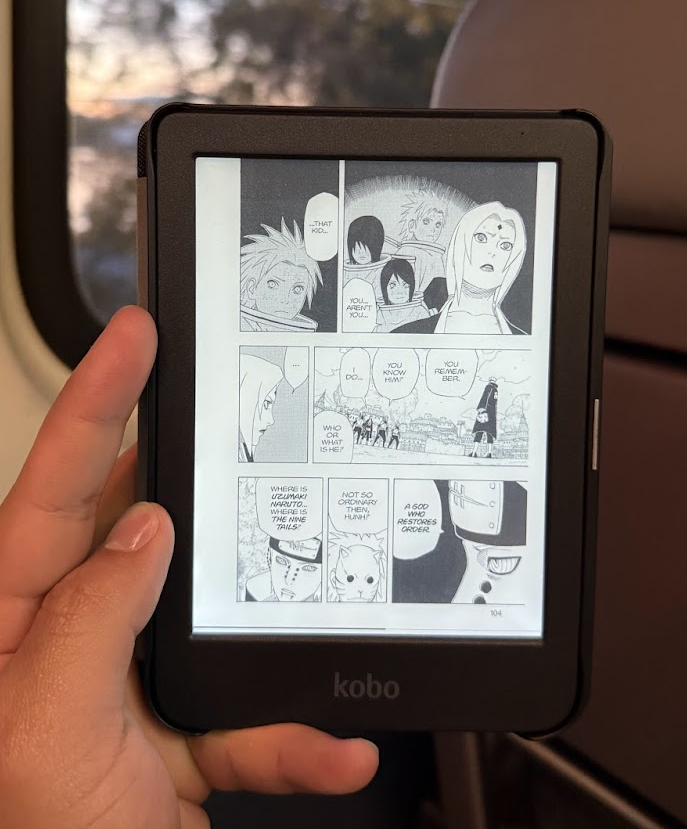 A picture of my Kobo Clara BW while I read on a train.